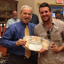 Ethan's ticket garnered him a Diamond Crown cutting board shaped like a football!