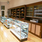 Lighters, Humidors, Cases, and Cutters Flank the Wall